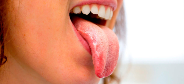 Бородавка во рту: причины, симптомы и лечение